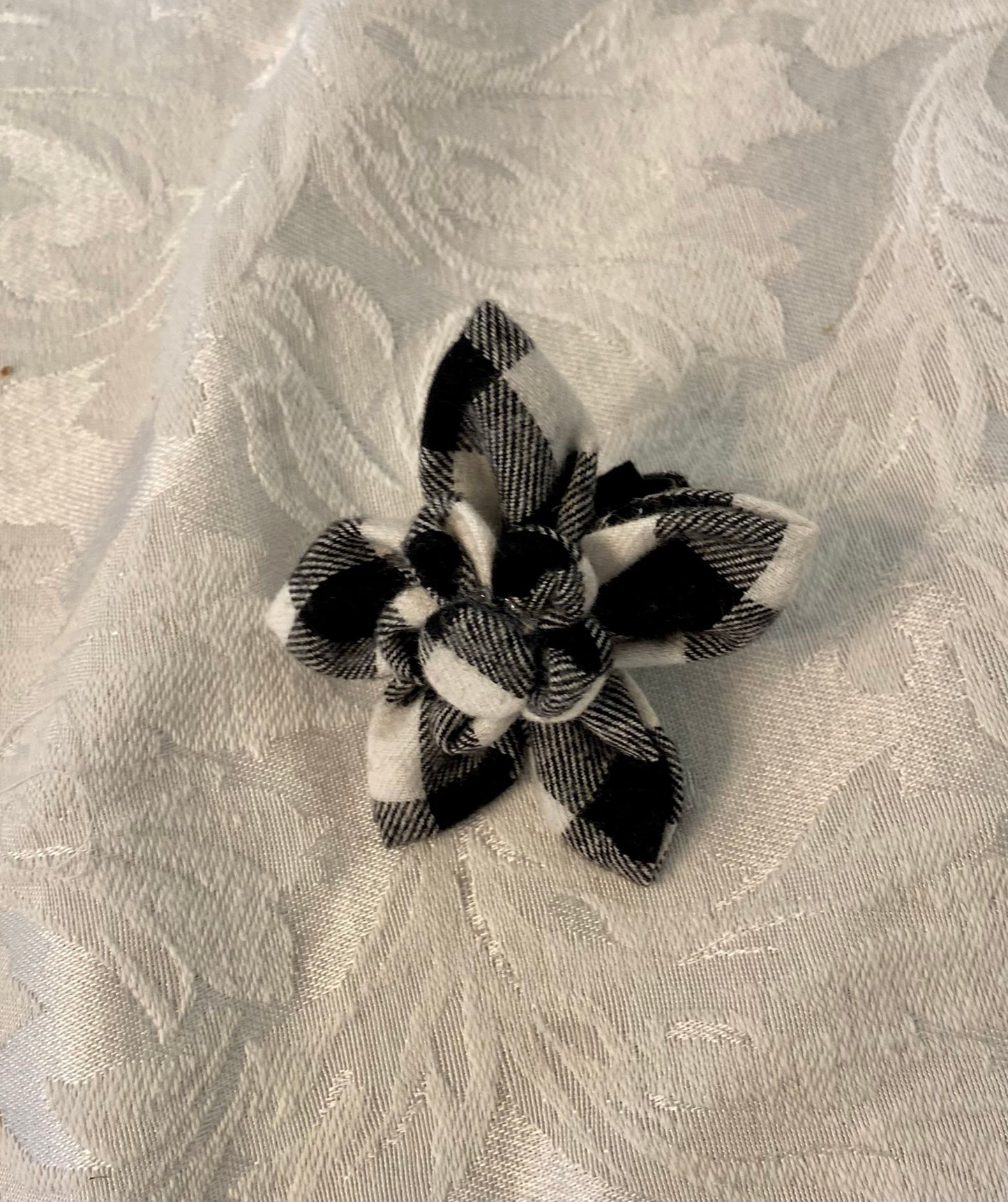 Black and off-white buffalo check pet flower bow