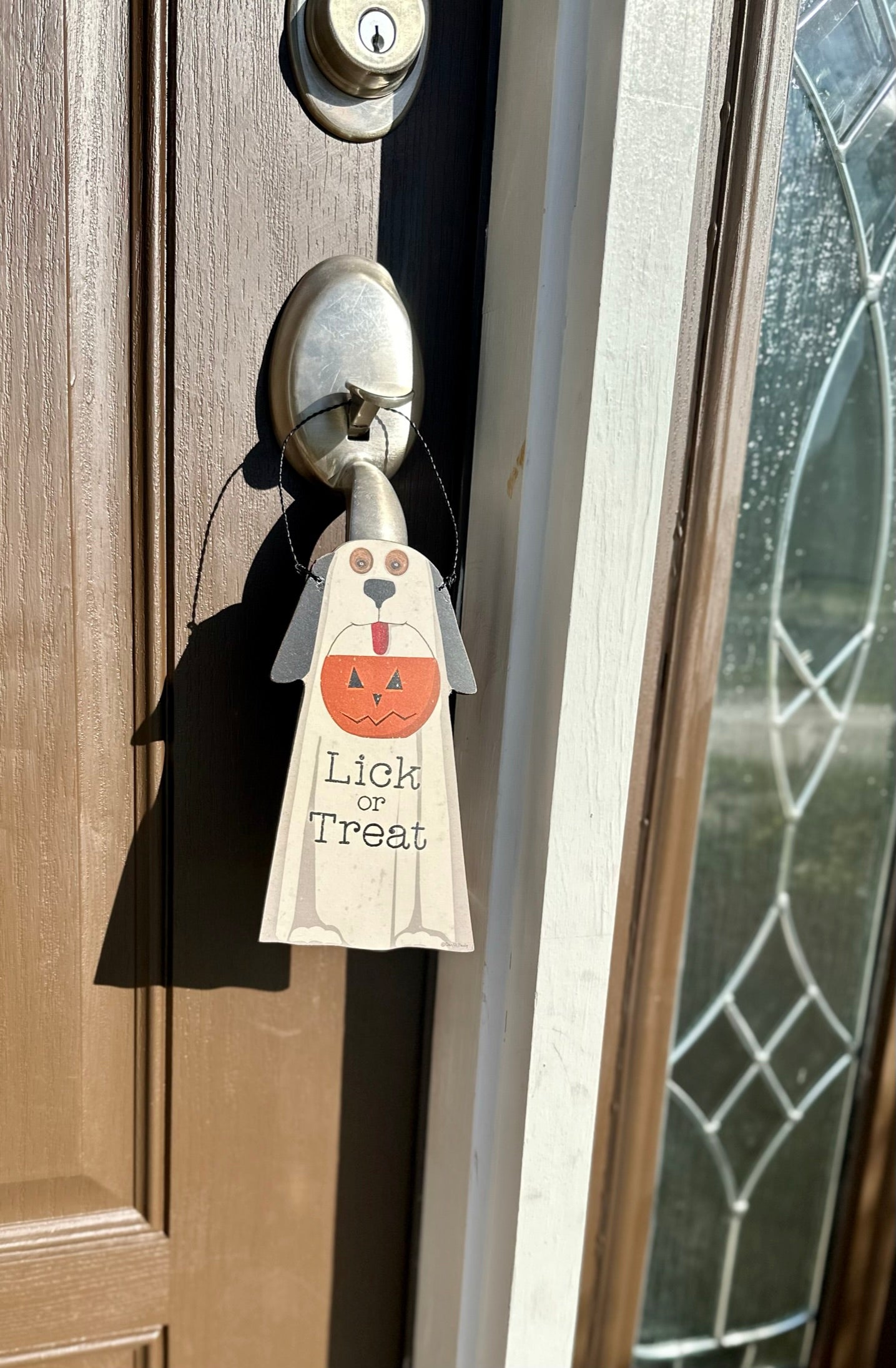 "Lick or Treat" door hanger